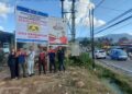 PT. Jasa Raharja Kotamobagu Lakukan Pemasangan Spanduk Keselamatan di Moyongkota