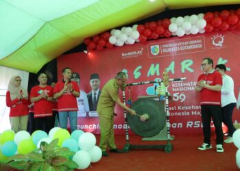 Pj Wali Kota Kotamobagu Hadiri Peringatan HKN ke -59 Sekaligus Launching Si Asri