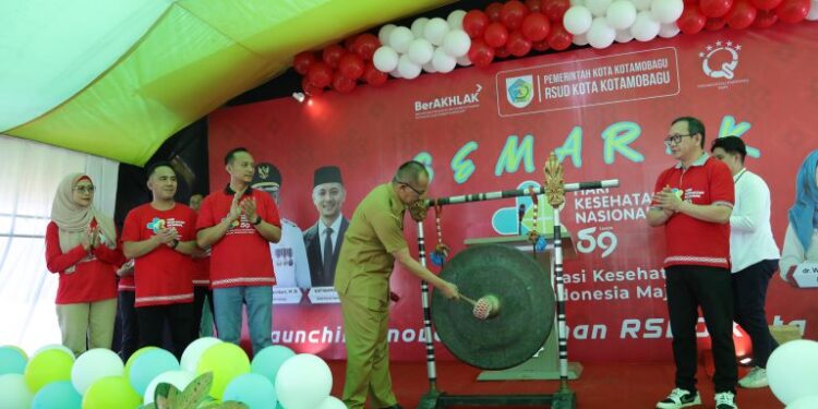 Pj Wali Kota Kotamobagu Hadiri Peringatan HKN ke -59 Sekaligus Launching Si Asri