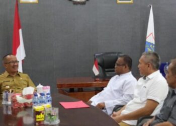 Pj Wali Kota Terima Kunjungan Pastor Paroki Kristus Raja Kotamobagu