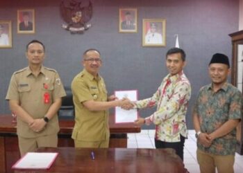 Rp.22.5 Miliar Dana Hibah Diserahkan Pemkot Kotamobagu ke KPU