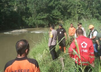 Kapolres Kotamobagu Pimpin Langsung Pencarian Anak Hanyut, Korban Ditemukan Setelah Pencarian Intensif