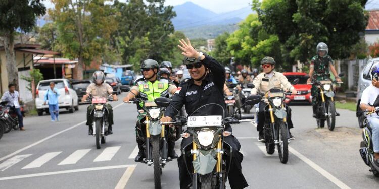 Gunakan Motor, Pj Wali Kota Pantau Pelaksanaan Pemilu Kotamobagu