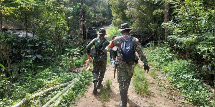 Pasiter Kodim 1303 Bolmong Survei Lokasi TMMD di Desa Modayag Tiga