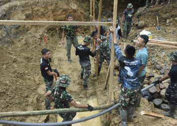 Plat Duiker TMMD 120 di Desa Modayag Tiga, Bukti Nyata Kebersamaan Masyarakat dan TNI 