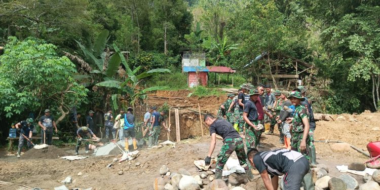 Kolaborasi TNI dan Warga: Satgas TMMD ke-120 Pacu Pembangunan Wujudkan Infrastruktur Desa Modayag Tiga