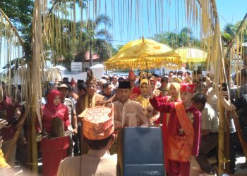 Pemkab Bolmong Gelar Penyambutan Adat untuk Pj Bupati dr. Jusnan Calamento Mokoginta, MARS