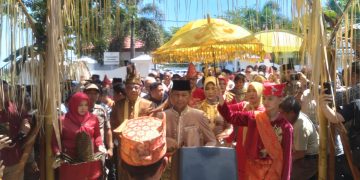 Pemkab Bolmong Gelar Penyambutan Adat untuk Pj Bupati dr. Jusnan Calamento Mokoginta, MARS