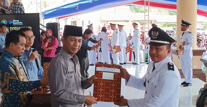 Pj Bupati Jusnan Mokoginta Kukuhkan 193 Sangadi dengan Masa Jabatan Diperpanjang Hingga 2027 dan 2030