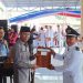 Pj Bupati Jusnan Mokoginta Kukuhkan 193 Sangadi dengan Masa Jabatan Diperpanjang Hingga 2027 dan 2030