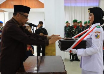 Pemkot Kotamobagu Gelar Pemindahan Bendera Merah Putih