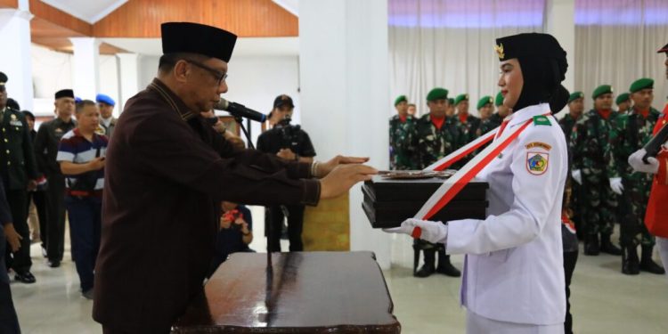 Pemkot Kotamobagu Gelar Pemindahan Bendera Merah Putih