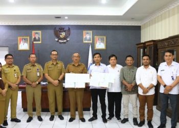 Pemkot Kotamobagu Serahkan Hibah Tanah Untuk KPU
