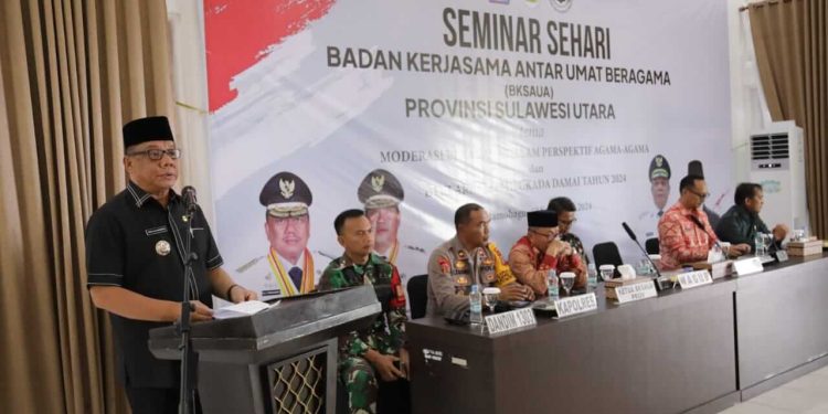 Pj. Walikota Kotamobagu Hadiri Seminar BKSAU dan Deklarasi Pilkada Sulut