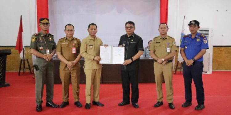 Pj Wali Kota Teken Nota Kesepakatan dengan Kemenkumham Sulut dan Pemkab Bolmong