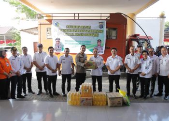 Walikota Kotamobagu Serahkan Bantuan untuk Korban Banjir di Bolmong